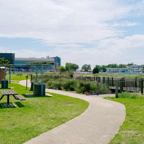 Open park next to a lake at Caulfield Race Course